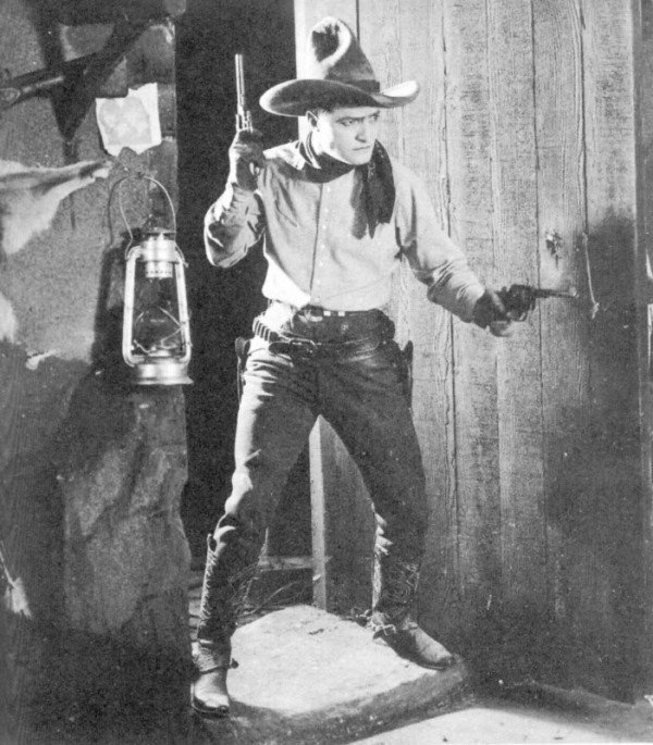 Western star Tom Mix wearing jeans in "The Untamed" (1920)